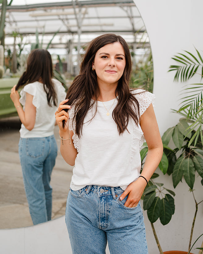 white eyelet ruffle top