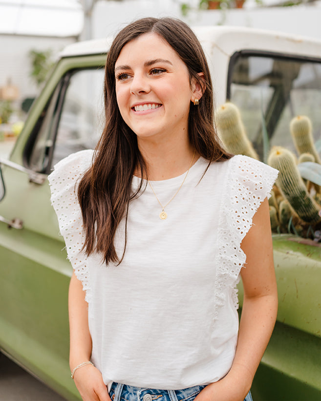white eyelet ruffle top